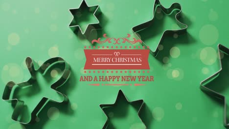 Animation-of-merry-christmas-and-happy-new-year-text-over-cookie-molds-on-green-background