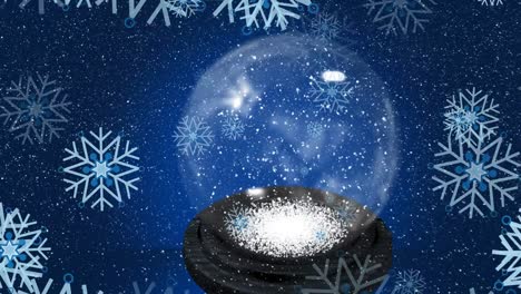 Animation-of-snowflakes-falling-over-christmas-snow-globe-on-dark-blue-background