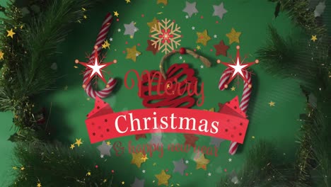 Animation-of-merry-christmas-text-over-decorations-on-green-background