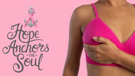 Animation-of-breast-cancer-awareness-text-over-biracial-woman