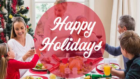 Animation-of-happy-holiday-text-in-circle-over-caucasian-family-having-christmas-meal