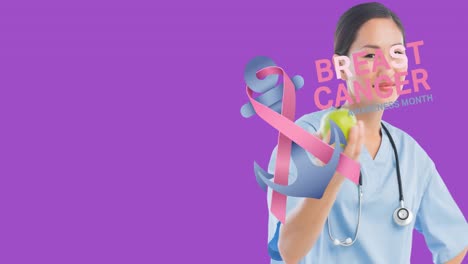 Animation-of-breast-cancer-awareness-text-over-asian-female-doctor