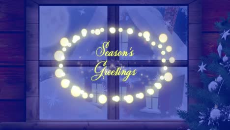 Animation-of-seasons-greetings-text-over-winter-scenery-and-snow-falling