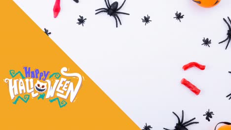 Animation-of-happy-halloween-text-over-spider