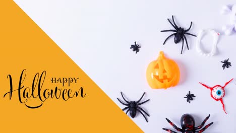 Animation-of-happy-halloween-text-over-spiders