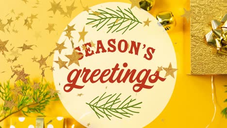 Animation-of-season's-greetings-text-over-stars-falling-and-presents-at-christmas
