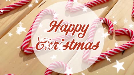 Animation-of-happy-christmas-text-over-stars-falling-and-candy-canes-on-table