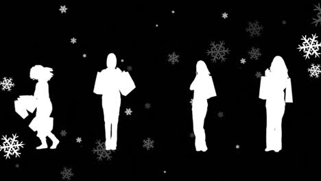 Animation-Von-Schnee,-Der-Zu-Weihnachten-über-Frauensilhouetten-Mit-Einkaufstüten-Auf-Schwarzem-Hintergrund-Fällt