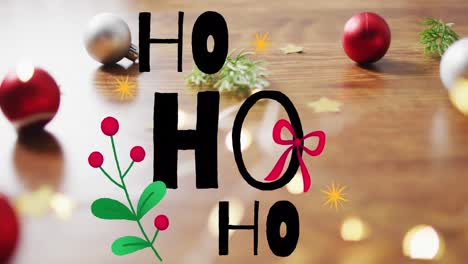 Animation-of-ho-ho-ho-text-over-christmas-decorations