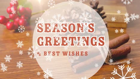 Animation-of-season's-greetings-text-over-snow-falling-and-christmas-decorations-on-table