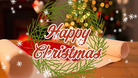 Animation-of-happy-christmas-text-over-wreath,-snow-falling-and-letter-on-table