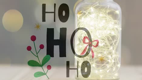 Animation-of-ho-ho-ho-text-over-christmas-lights
