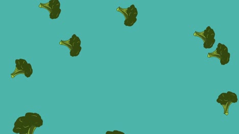 Animation-of-green-broccoli-florets-falling-on-blue-background