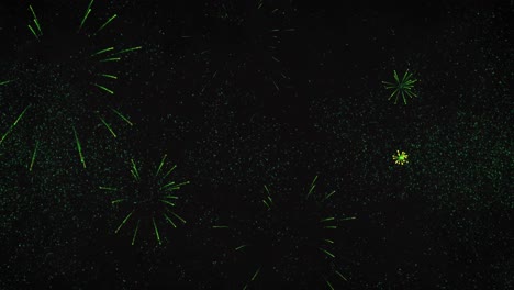 Animation-of-new-year's-eve-greetings-and-green-fireworks-exploding-on-black-background