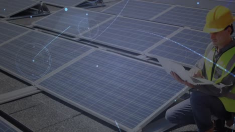 Animation-of-network-of-connections-over-solar-panels-and-male-engineer-in-background