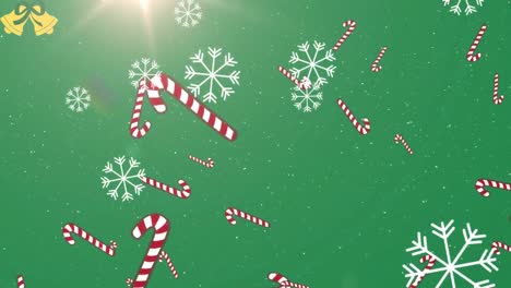 Animation-Von-Schnee,-Der-über-Weihnachtszuckerstangen-Auf-Grünem-Hintergrund-Fällt