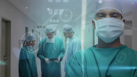 Animation-of-network-of-connections-over-surgeons-in-face-masks