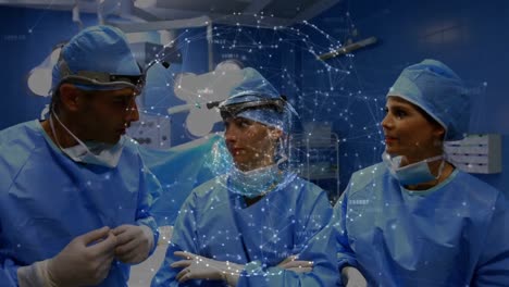 Animation-of-globe-with-network-of-connections-over-surgeons-in-operating-theatre