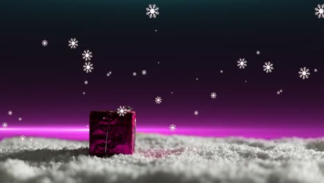 Animation-of-snow-falling-over-christmas-present-with-pink-light-in-a-night-sky