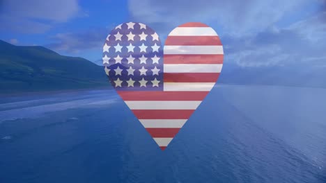 Animation-of-flag-of-america-heart-shape-and-red,-white-and-blue-circles-over-sunny-beach-and-ocean