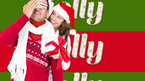 Animation-of-jolly-text-on-red-and-green-stripes-and-happy-couple-with-christmas-hats-and-present
