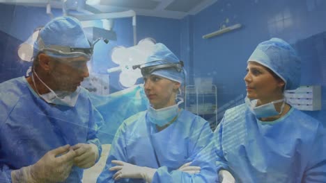 Animation-of-globe-with-data-processing-over-surgeons-in-operating-theatre
