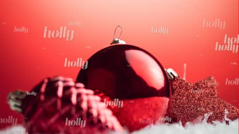 Animation-of-holly-text-in-repetition-over-christmas-decorations