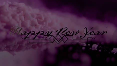 Animation-of-happy-new-year-greetings-over-decoration-and-purple-specks-in-background