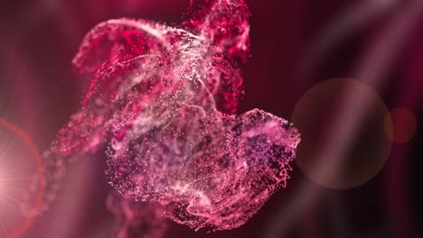 Animation-of-pink-and-red-particles-moving-with-bokeh-lights-on-black-background