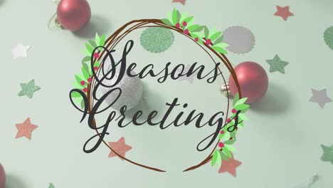 Animation-of-seasons-greetings-text-over-christmas-decorations