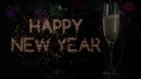 Animation-of-happy-new-year-greetings-over-glass-of-champagne-and-fireworks-exploding