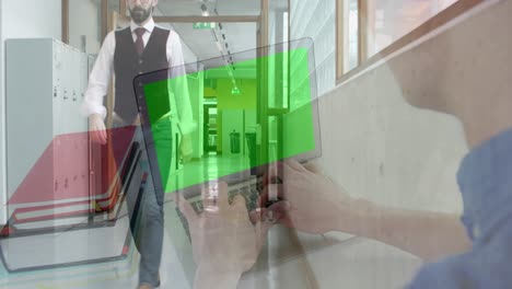 Animation-of-businessman-using-laptop-with-green-screen-over-businessman-walking-in-office-corridor