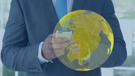 Animation-of-yellow-global-network-over-businessman-using-smartphone