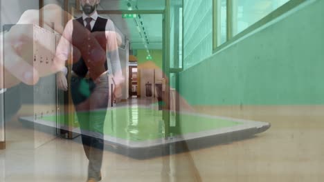 Animation-of-hands-of-man-using-tablet,-over-businessman-walking-in-workplace-corridor