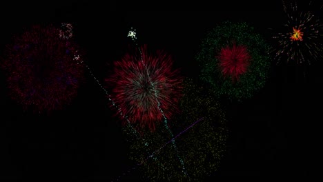 Animation-of-colourful-christmas-and-new-year-fireworks-in-night-sky