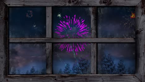 Animation-of-window-with-colourful-christmas-and-new-year-fireworks-over-trees-in-night-sky