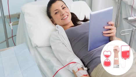 Animation-of-hourglass,-arm-and-blood-bag-symbol,-over-smiling-female-donor-lying-down-using-tablet