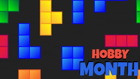 Animation-Des-Hobby-Monatstextes-In-Rot-Und-Blau-über-Farbigen-Blöcken,-Die-Auf-Den-Bildschirm-Eines-Computerspiels-Fallen