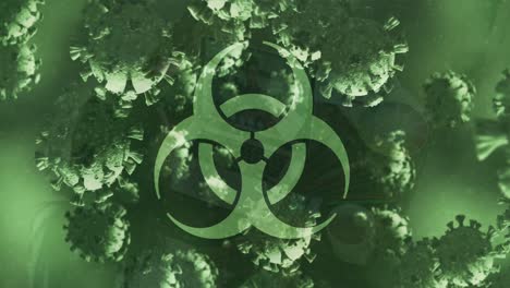 Animation-of-biohazard-sign-and-covid-19-cells-floating-over-green-background