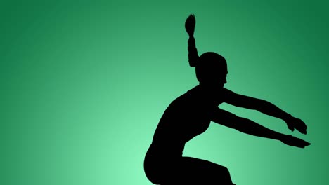 Animation-of-silhouette-of-female-athlete-landing-from-jump-on-green-background