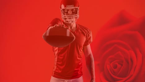 Animation-of-american-football-player-holding-ball-over-red-rose-background