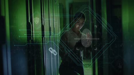 Animation-of-biometric-fingerprint-over-caucasian-female-it-engineer-with-tablet-by-computer-servers