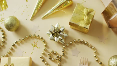 Shoes,-decorations-and-stars-on-yellow-background-at-new-year's-eve
