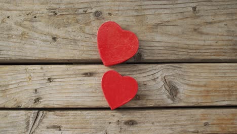 Red-wooden-hearts-on-wooden-background-at-valentine's-day