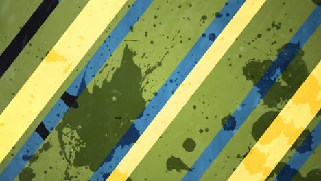 Animation-of-yellow-and-blue-stripes-of-paint-on-green-background