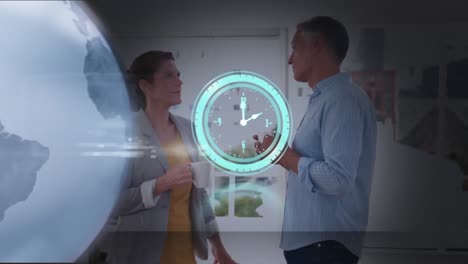 Animation-of-globe-and-clock-on-scanner-processing-data-over-man-and-woman-in-office-talking