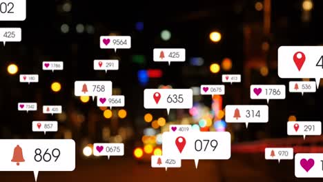 Animation-of-social-media-icons-and-numbers-over-out-of-focus-city-and-traffic-lights