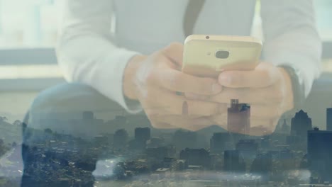 Animation-of-cityscape-over-caucasian-businessman-using-smartphone