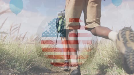 Animation-of-american-flag-over-diverse-couple-hiking-in-mountains