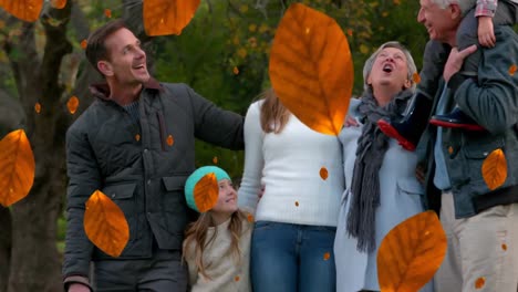 Animation-Von-Herbstblättern,-Die-über-Eine-Glückliche-Kaukasische-Familie-Im-Park-Fallen